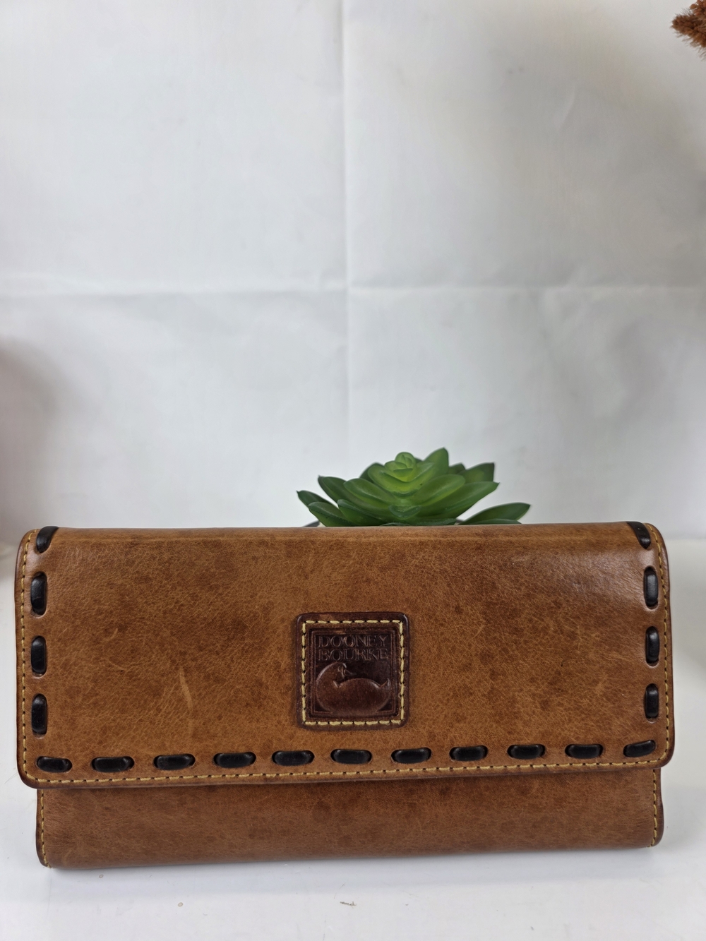 Dooney & Bourke Brown Leather Trifold Wallet with Stitch Detail
